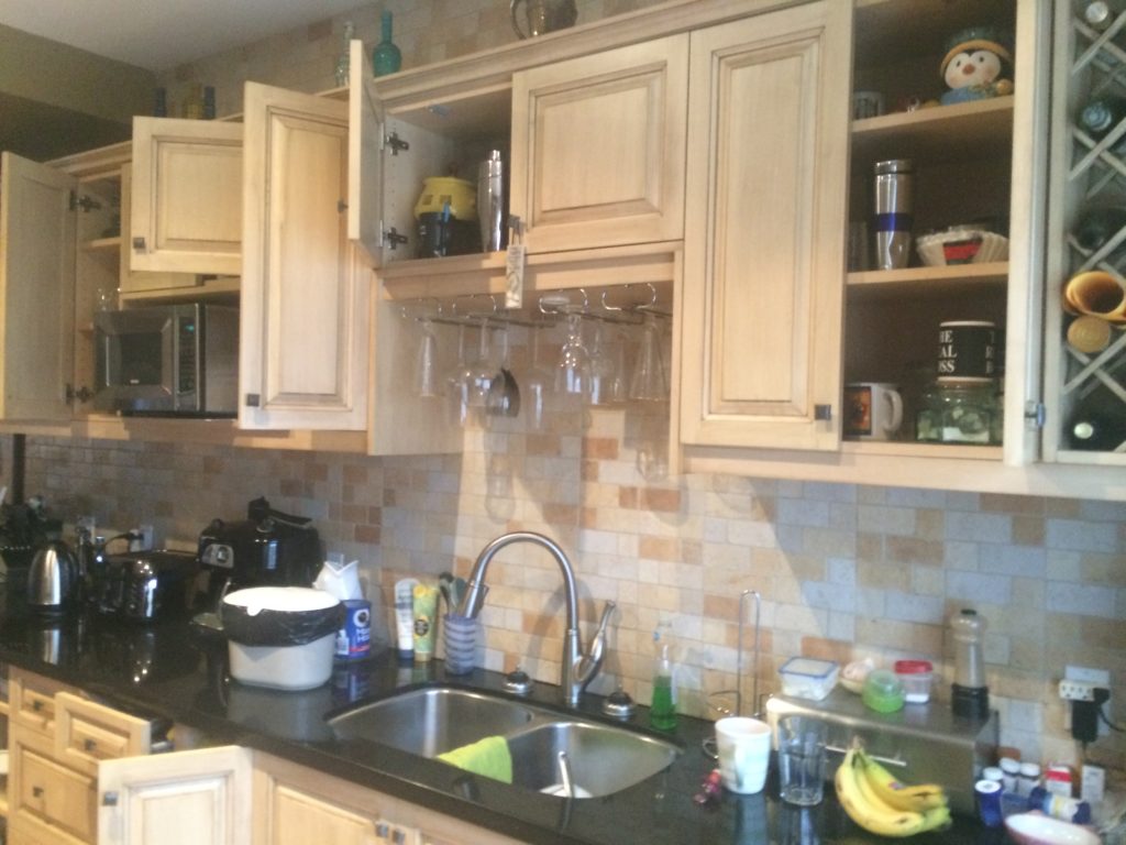 Open cupboards in the kitchen.