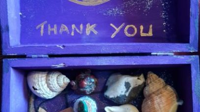 the psychic box with writing small