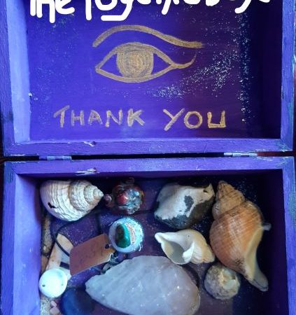 the psychic box with writing small